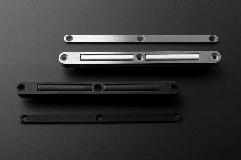 Magnetic door closing system with adjustable block M&T Magnetic